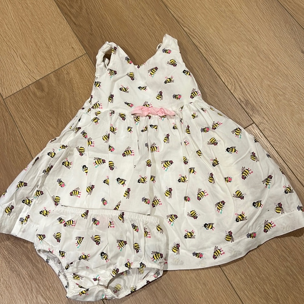 Little girls white dress with bee design and bloomers to match.